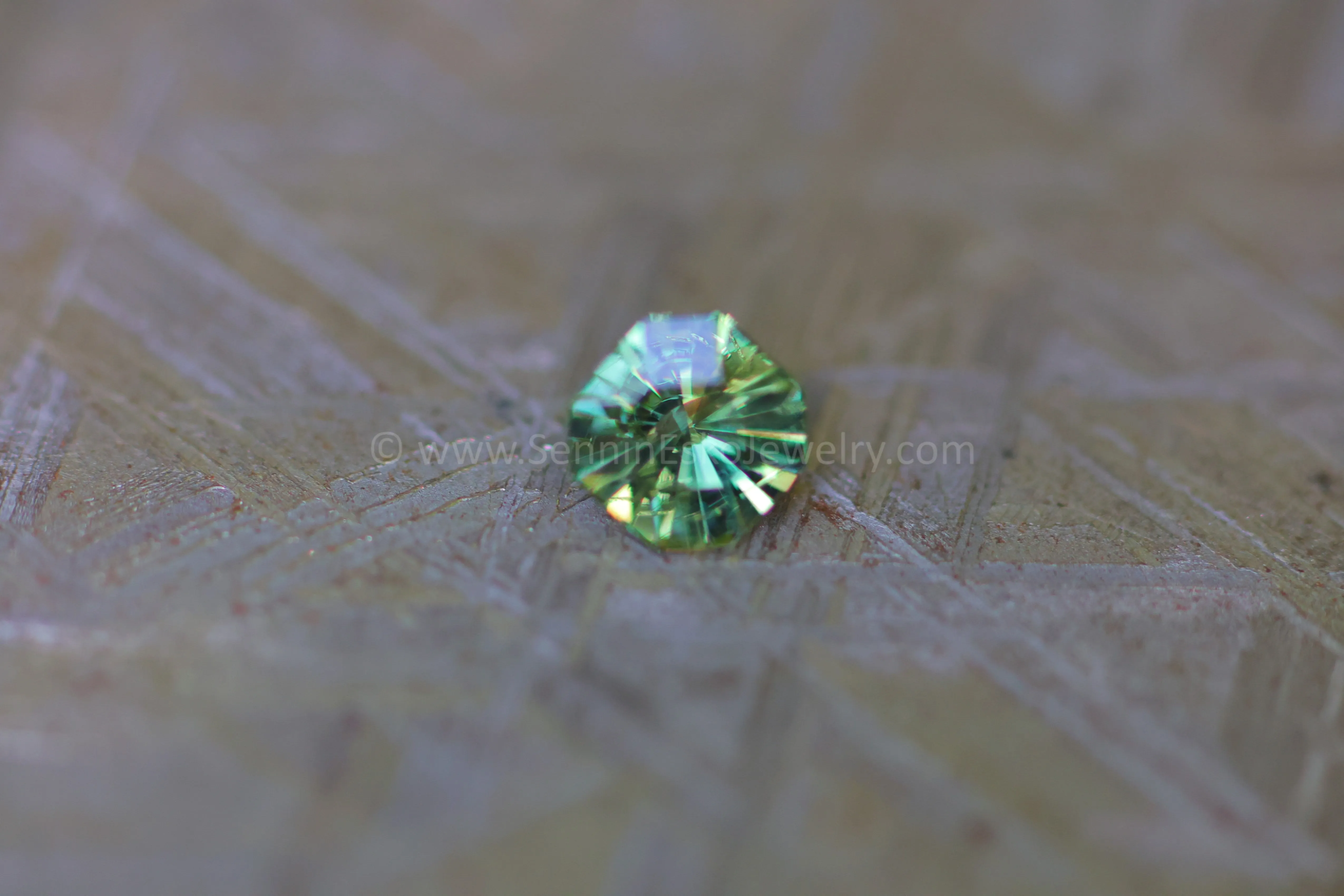 (Less Than Perfect) 0.58 carat Yellowish Green Sapphire Octagon -  Precision Cut, 4.8x5.1mm