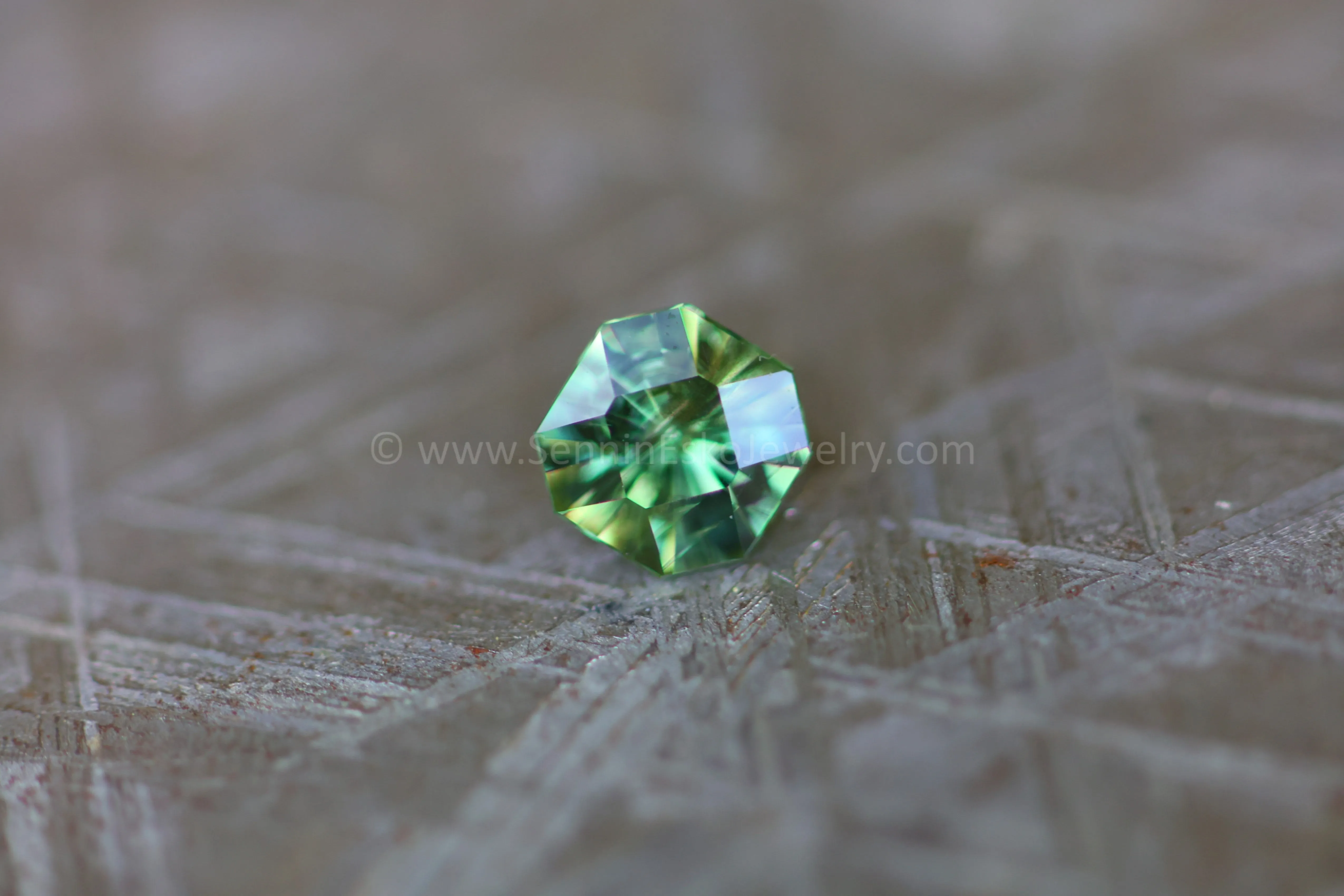 (Less Than Perfect) 0.58 carat Yellowish Green Sapphire Octagon -  Precision Cut, 4.8x5.1mm