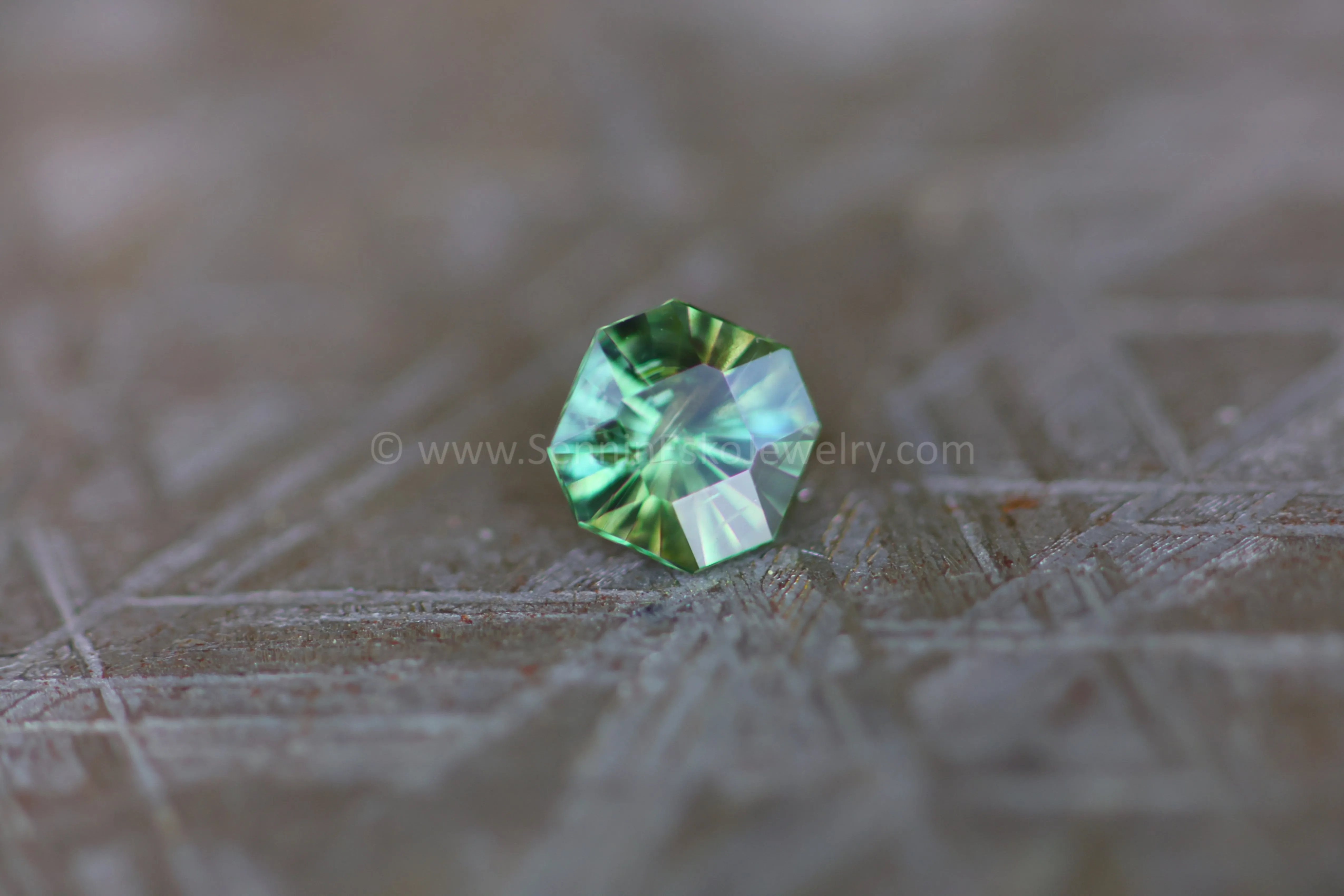 (Less Than Perfect) 0.58 carat Yellowish Green Sapphire Octagon -  Precision Cut, 4.8x5.1mm