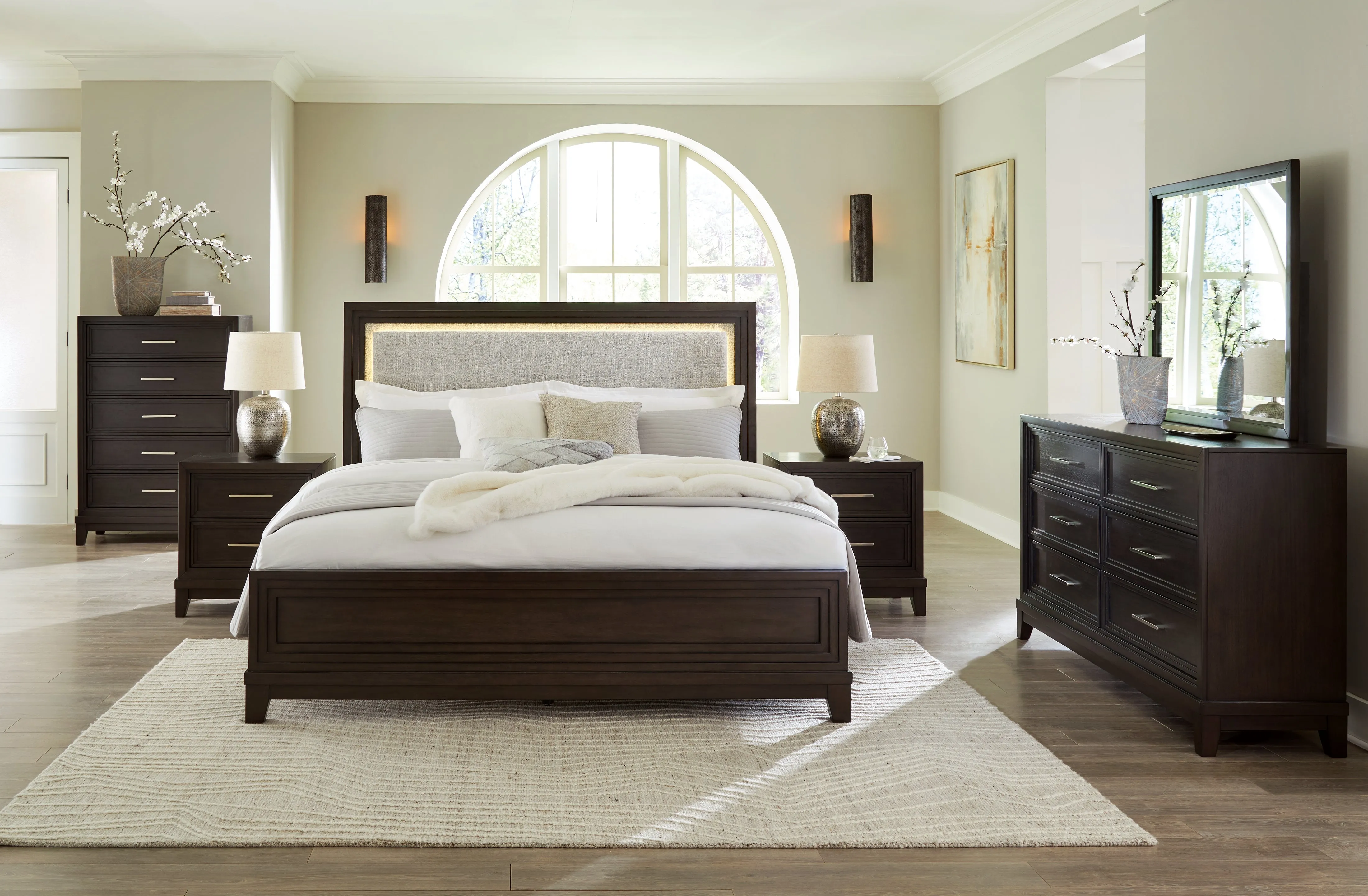Neymorton Queen Upholstered Panel Bed with Mirrored Dresser and Nightstand in Dark Grayish Brown