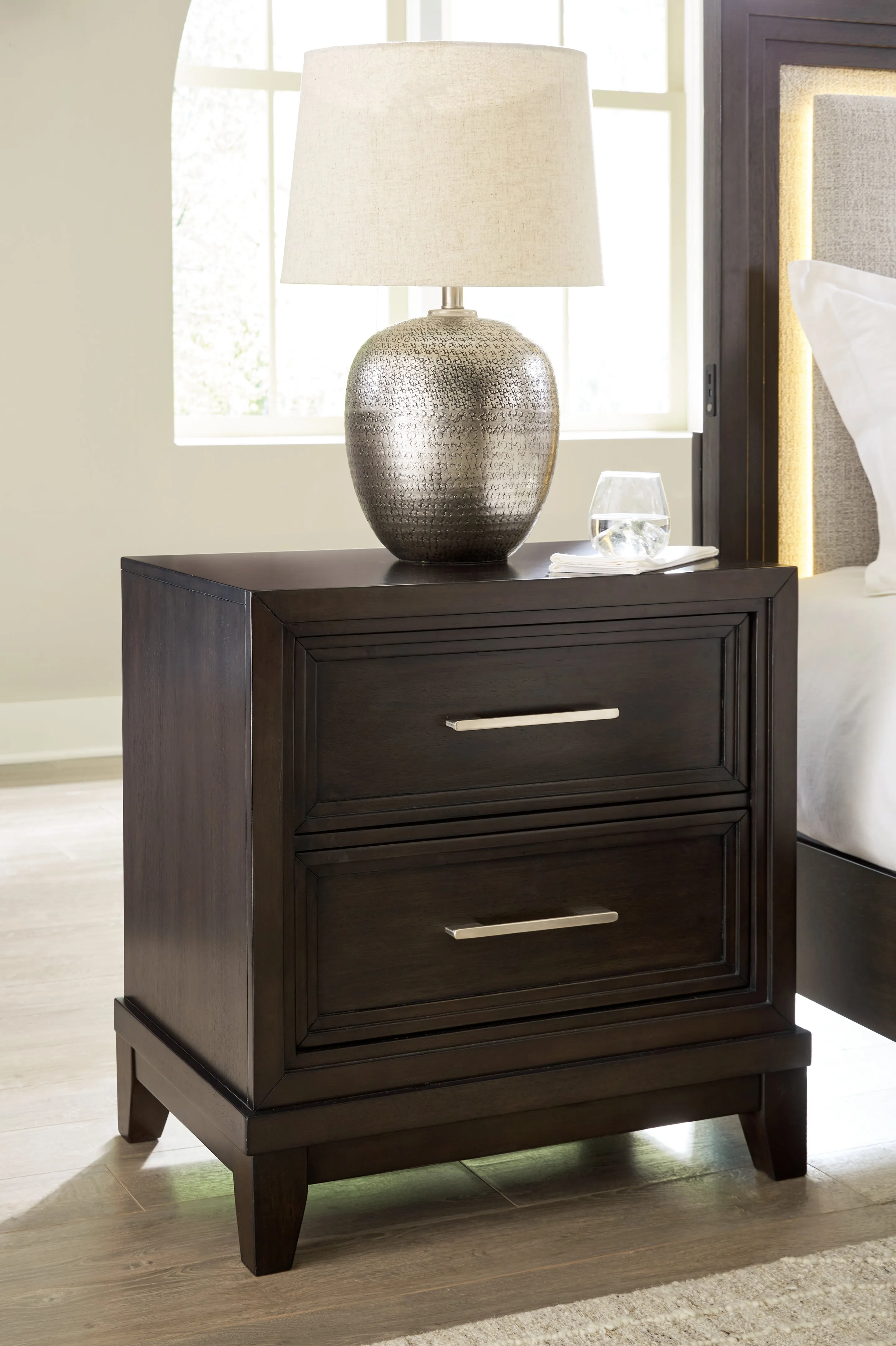 Neymorton Queen Upholstered Panel Bed with Mirrored Dresser and Nightstand in Dark Grayish Brown