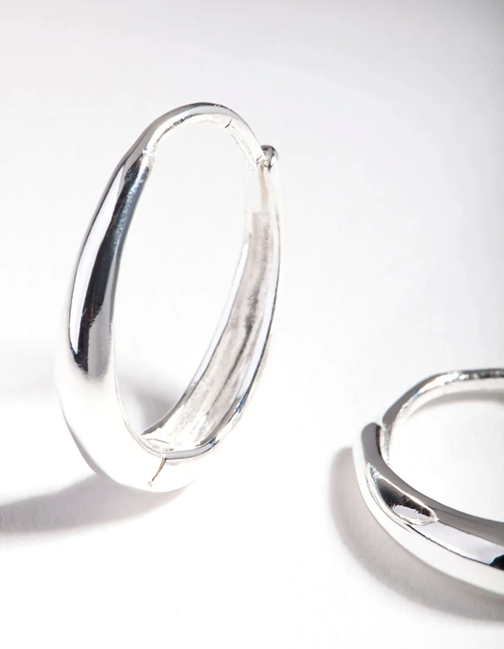 Sterling Silver Oval Drop Huggie Earrings