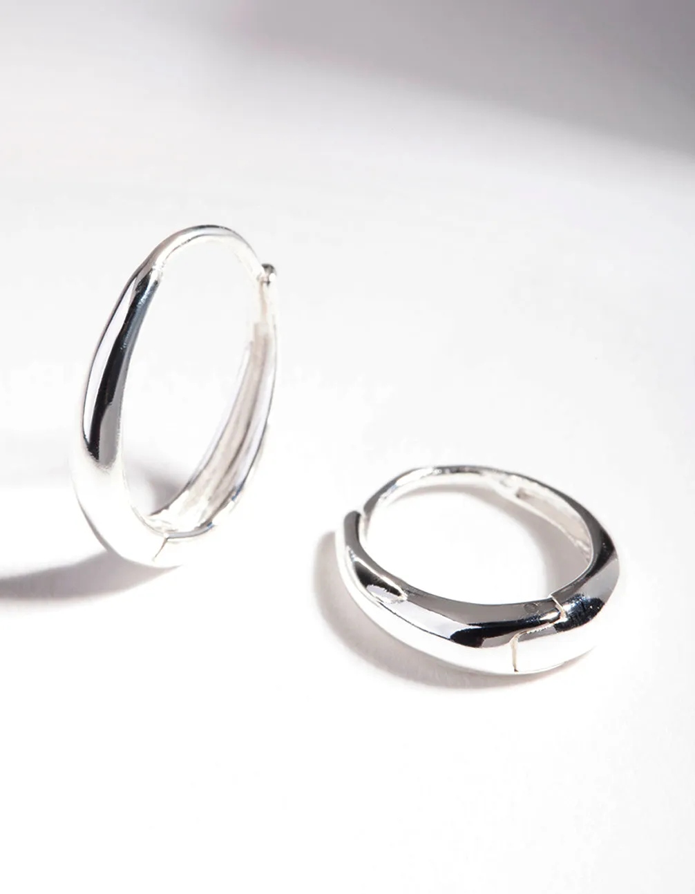 Sterling Silver Oval Drop Huggie Earrings